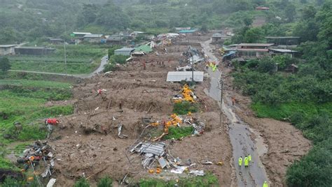 Days of torrential rain in South Korea leave at least 22 dead in landslides and floods